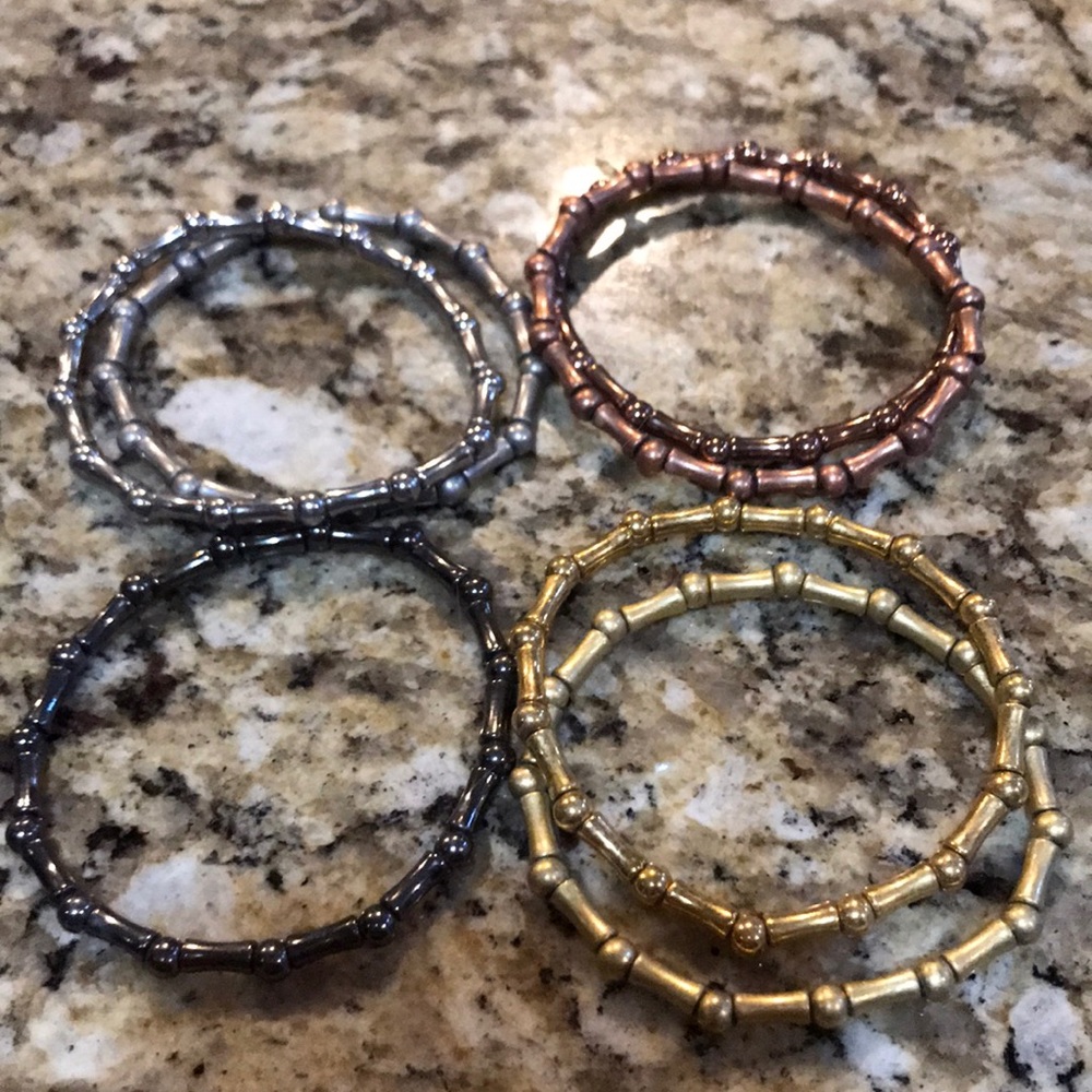 Lia Sophia set of 7 bracelets.